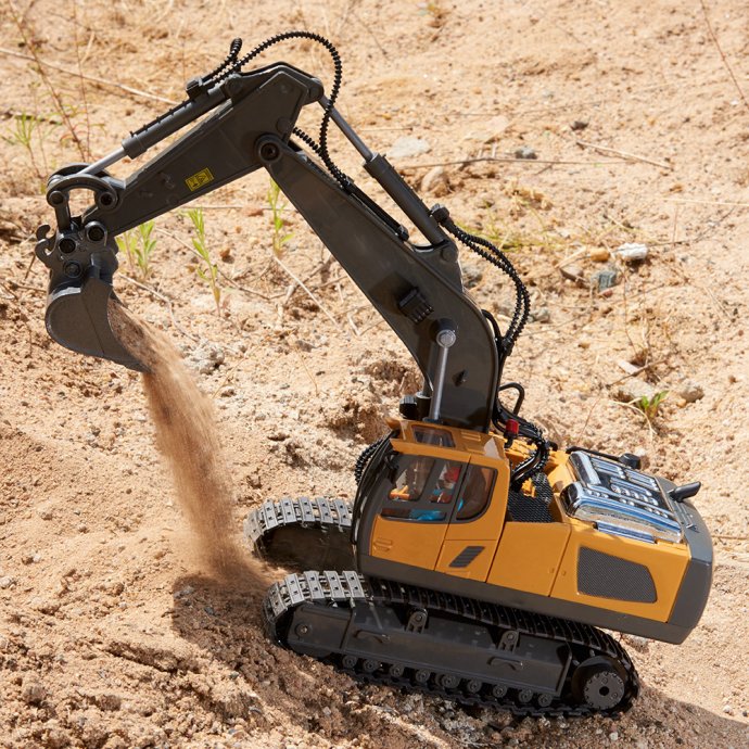 Radiogestuurde graafmachine