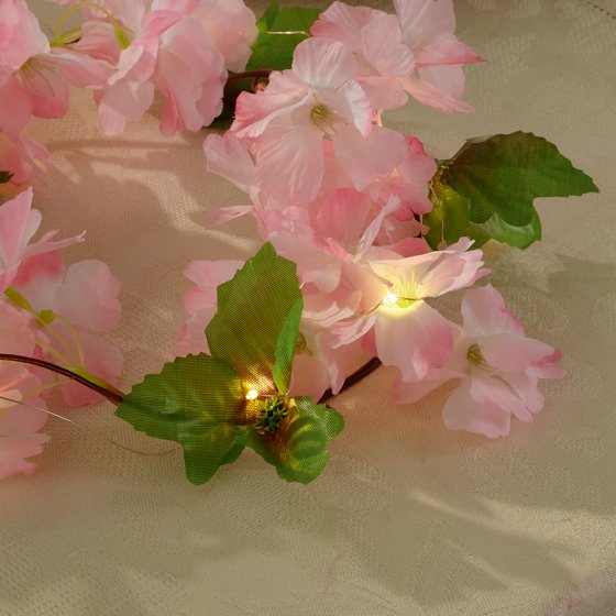Bloemenslinger met lichtjes