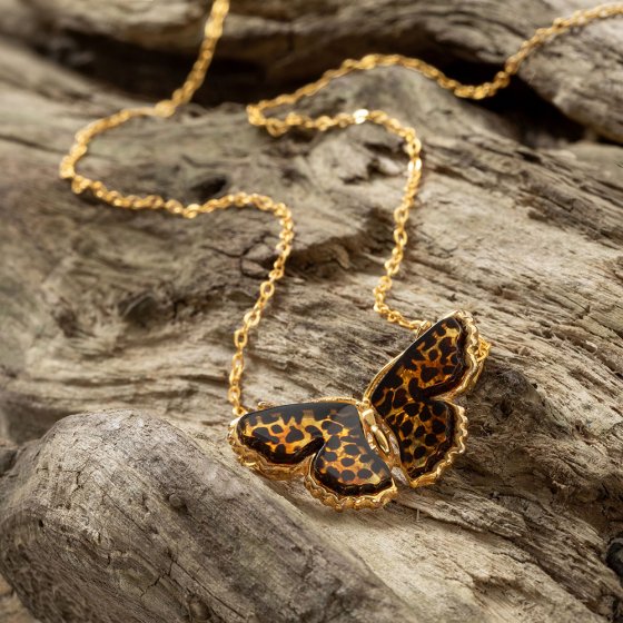 Vlinderhanger van barnsteen 