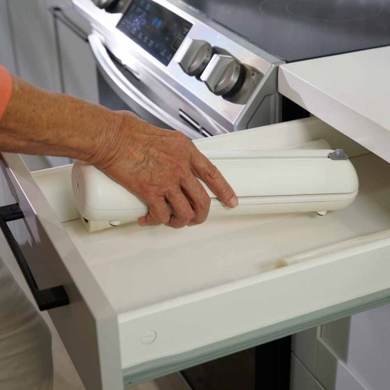 Vacumeermachine met foliesnijder 